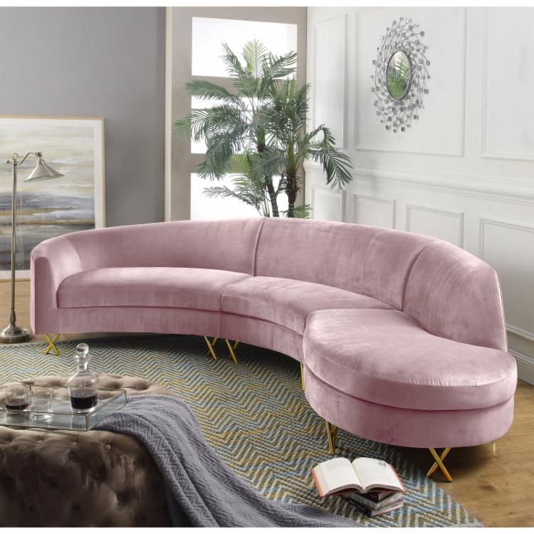 Meridian furniture in serpentine upholstered sectional sofa pink