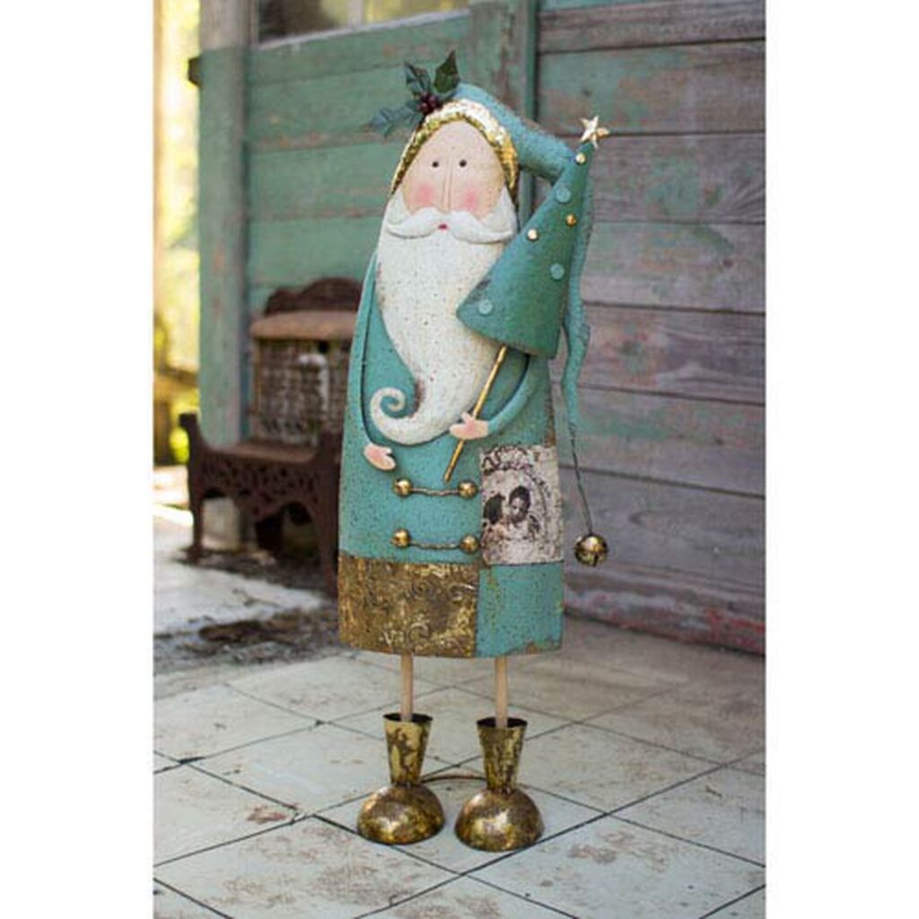 Colorful Christmas decorations—Metal Santa with a tree