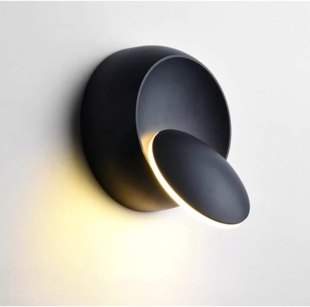 rotating eclipse wall light