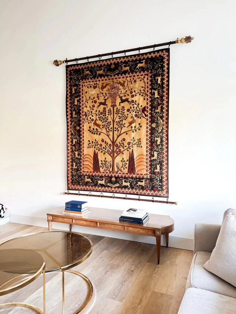 living room wall decor—A vintage tapestry hanging on a living room
